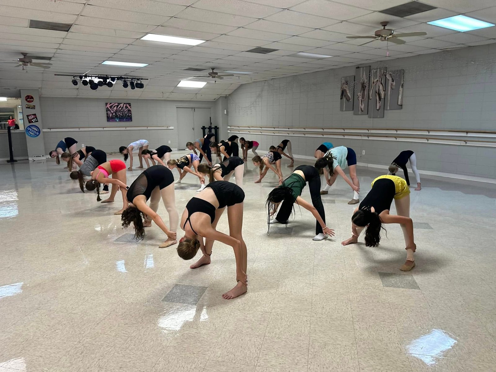 Dance students stretching